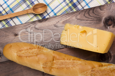 Breakfast with a French loaf and cheese