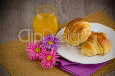 Croissants with orange juice