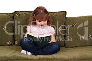 little girl reading book