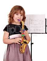 little girl with saxophone