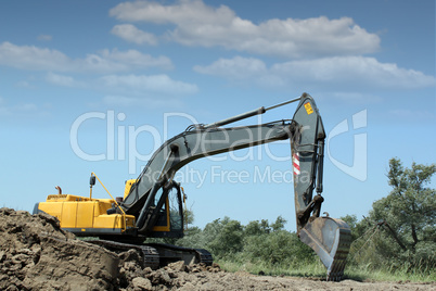 excavator working on road construction