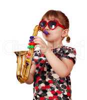 little girl play saxophone