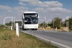 white bus on the road