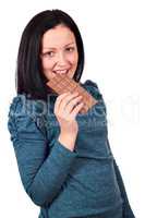 teenage girl eating chocolate