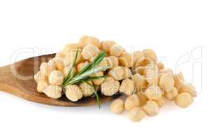 Chickpeas over wooden spoon
