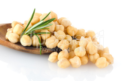 Chickpeas over wooden spoon