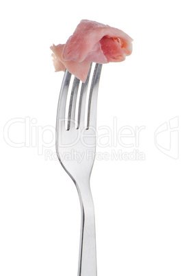 Slice of ham skewered on a fork