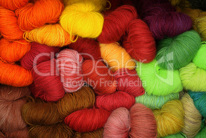 large collection of different colored wool