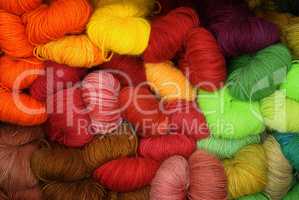 large collection of different colored wool