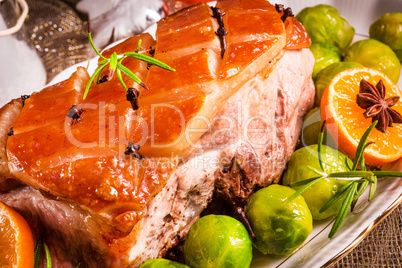 Christmas dinner with brussels sprouts in orange sauce