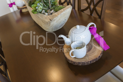Abstract of Inviting Table Setting with Tea and Kettle