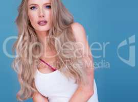 Trendy attractive intense young blond woman