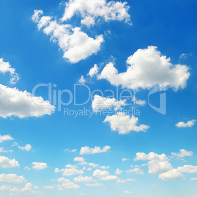 cumulus clouds in the blue sky