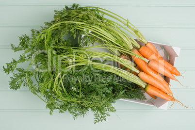 Carrots on wooden table