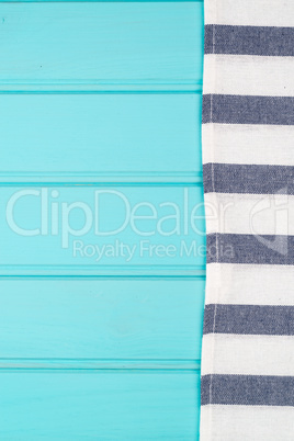 Blue and white towel over table