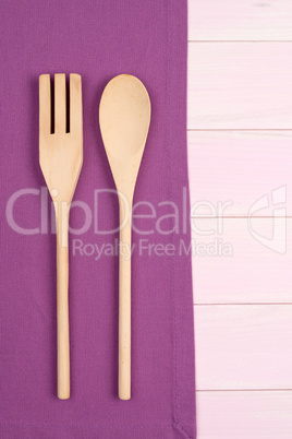 Kitchenware on purple towel