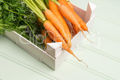 Carrots on wooden table