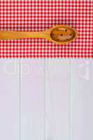 Kitchenware on red towel