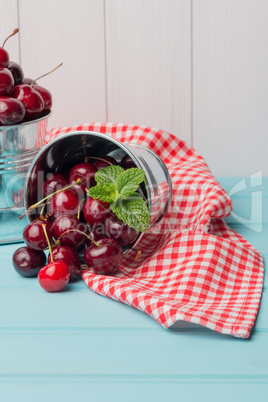 Cherries in blue wooden table Cherries in blue wooden table