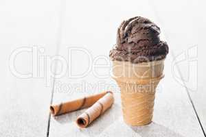 Brown ice cream in waffle cone