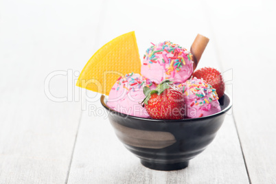 Pink ice cream in bowl