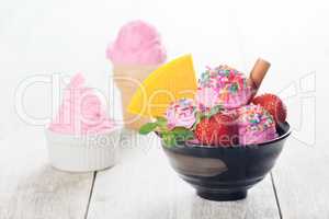 Pink ice cream with strawberry fruits