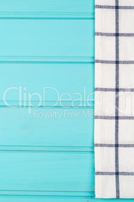 Blue and white towel over table