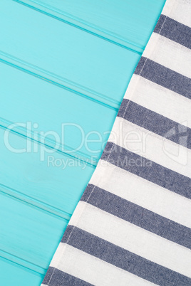 Blue and white towel over table