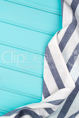 Blue and white towel over table