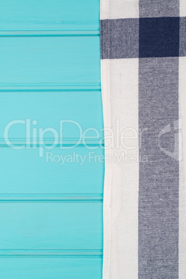 Blue and white towel over table