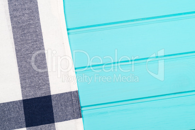 Blue and white towel over table