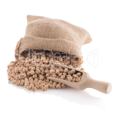 Uncooked chickpeas and wooden scoop