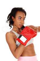 African American woman with boxing gloves.