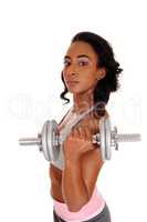 Teenager girl exercising with dumbbell's.
