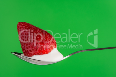 Strawberry and chocolate on a fork