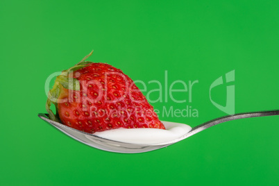 Strawberry and chocolate on a fork