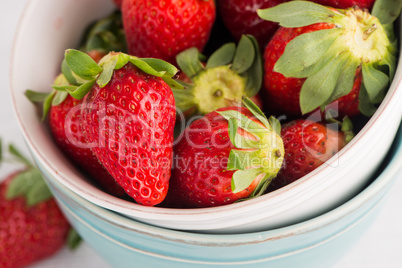 Bowls with strawberries