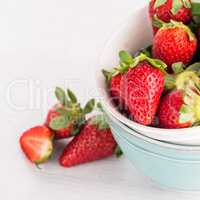 Bowls with strawberries