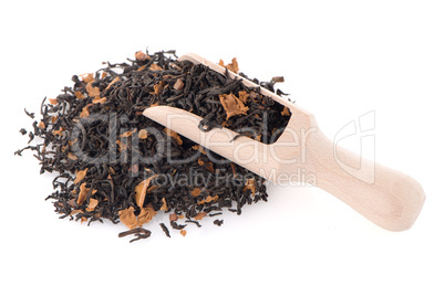 Black Dry Tea with a Wooden Spoon