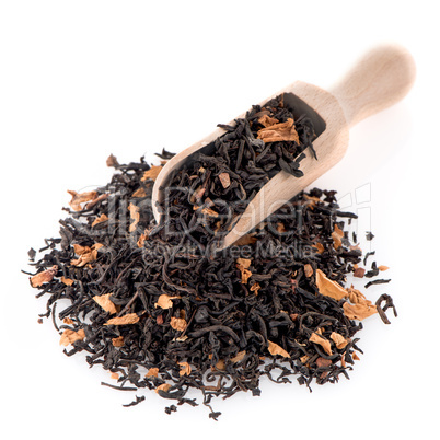 Black Dry Tea with a Wooden Spoon