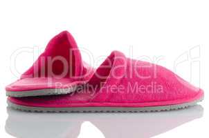 A pair of pink slippers