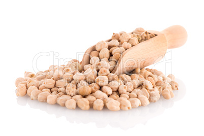 Uncooked chickpeas and wooden scoop