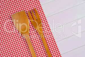 Kitchenware on red towel