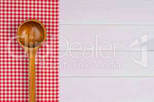 Kitchenware on red towel