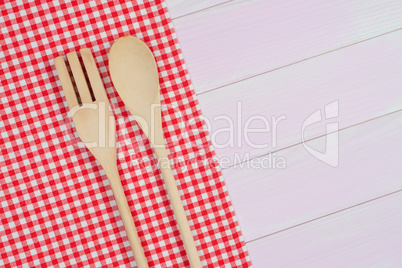 Kitchenware on red towel