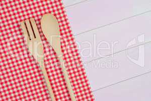 Kitchenware on red towel