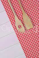 Kitchenware on red towel