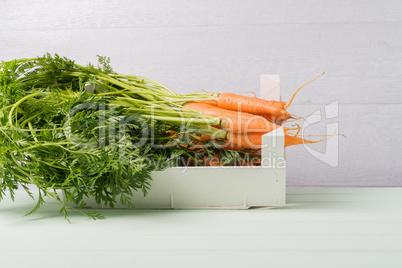 Carrots on wooden table