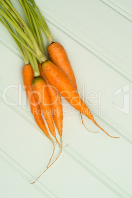 Carrots on wooden table