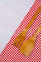 Kitchenware on red towel